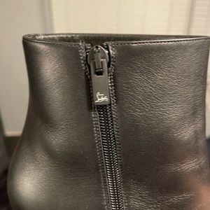 Christian Louboutin Booties.  Worn for less than 5 minutes.  Brand New